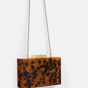 Zara tortoise cross body clutch